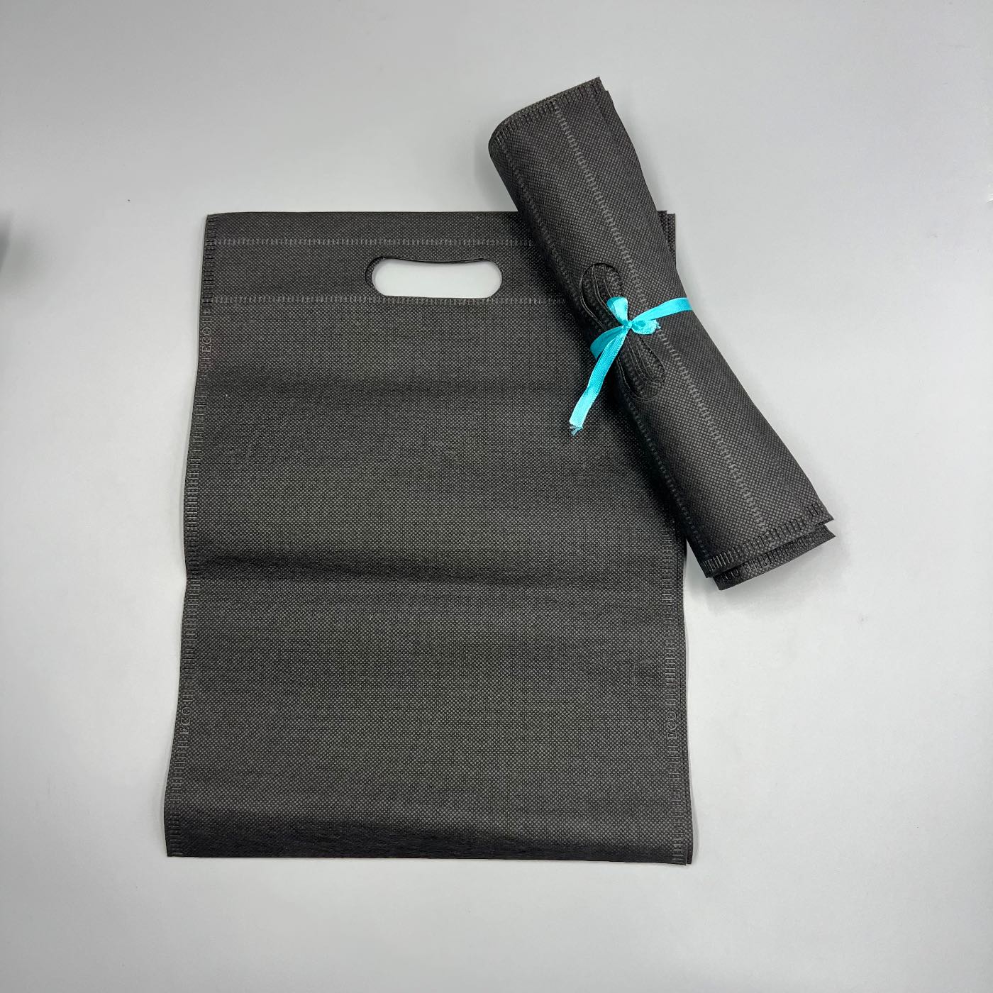 Non Woven D-Cut packaging bag — Black
